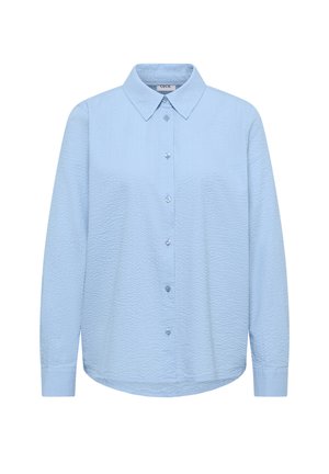 Chemise à manches longues texturée bleu clair avec col pointu et poignets classiques, étiquetée "Cecil" à l'intérieur du col.
