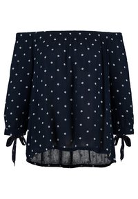 Blusa navy scollata con motivi geometrici bianchi, maniche lunghe con dettagli a fiocco, tessuto leggero e fluido, vestibilità morbida.