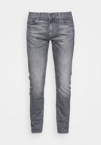 Jeans in denim grigio, con una vestibilità slim, design a cinque tasche e una finitura sfumata. Presentano una chiusura con zip e bottone.