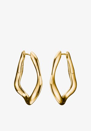 Creolen in Gold-Ton mit wellenförmiger, organischer Form. Glatte Oberfläche mit glänzendem Finish, die eine moderne Designästhetik zeigt.
