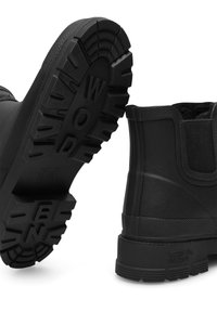 Woden Bottes en caoutchouc - black