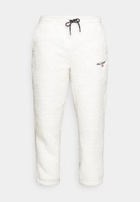 Vita sweatpants med elastisk midjeband, justerbar dragsko, sidofickor och broderad logo på låret.