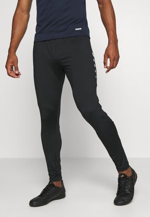 PREMIUM - Tracksuit bottoms - schwarz