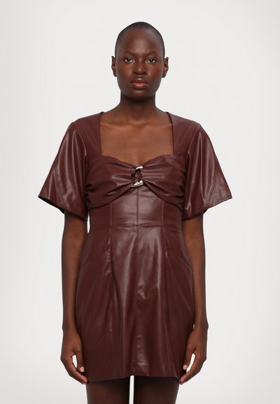 Brown faux leather dress with a square neckline, short puff sleeves, and a bow detail at the center, featuring vertical stitching and a fitted silhouette.