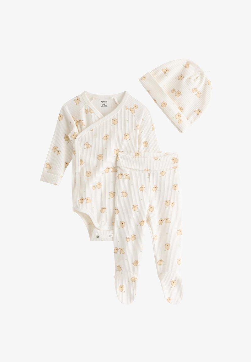 Set per neonati in cotone bianco a coste con stampa floreale. Include un body a portafoglio a maniche lunghe, pantaloni e un cappellino abbinato. Cuciture accentuate.