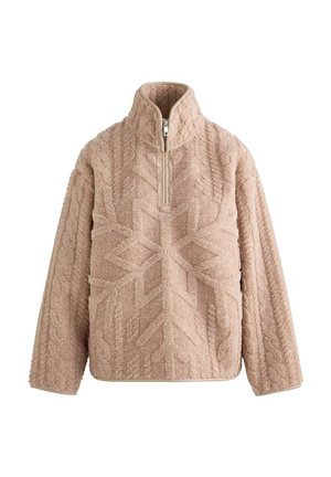 Beige fleece pullover with a high collar and zippered neck. Features textured patterns resembling snowflakes and cable knit. Soft, warm fabric.