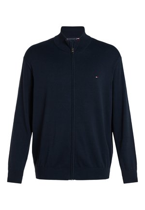 Maglione con zip blu navy con colletto, polsini e orlo a coste, caratterizzato da un piccolo logo Tommy Hilfiger sul petto a sinistra.
