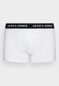 Boxer-briefs en coton blanc avec une ceinture élastique noire portant l'inscription "JACK & JONES" en lettres blanches. Texture lisse, coupe ajustée.