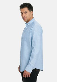 EMBLEMS Camisa - celeste