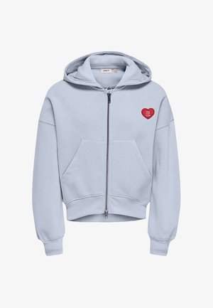 Sweat à capuche zippé bleu clair avec poches avant et un patch cœur rouge sur la poitrine gauche portant l'inscription "The VIP Club."