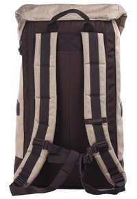 Plecak Burton w kolorystyce w odcieniach brązu i beżu, z wyściełanymi ramiączkami oraz klapką zwijaną. Wykonany z trwałego materiału, z regulowanymi elementami.