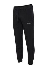 Schwarze Jogginghosen aus weichem Stoff, mit einem elastischen Bund und Kordelzug, seitlichen Taschen und einem kleinen Logodruck am Oberschenkel.
