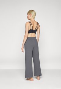 Yogasearcher MATSYA - Treniņtērpa apakšdaļas - lavastone