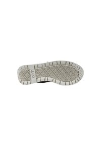 Scarpa nera con suola in gomma beige, caratterizzata da una superficie testurizzata e un grip a motivo. La suola presenta un bordo ondulato e disegni esagonali.