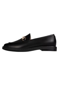 Black leather loafers with a smooth finish, featuring a gold-tone hardware detail on the vamp and a low, flat sole.