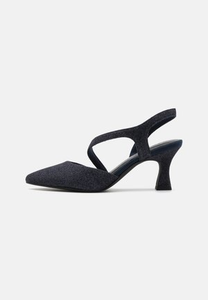 Spidse slingback sko i mørkeblå tekstureret stof med en midt-høj hæl og krydset stropdesign. Blødt indvendigt fôr.