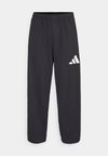 ESSENTIALS WIDE 3 BAR - Tracksuit bottoms - black/white