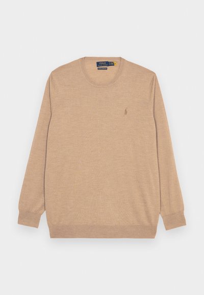 Kreminė ilga rankovė puloveris, pagamintas iš minkštos trikotažo medžiagos. Turi apvalų iškirpimą ir mažą logotipą kairėje krūtinės pusėje. Rankogaliai yra prigludę.