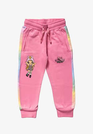 Un pantalon de survêtement rose présente un motif de licorne sur la jambe gauche, avec des rayures arc-en-ciel multicolores le long du côté. Taille et poignets élastiques.
