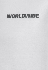 White t-shirt with ribbed texture featuring the word "WORLDWIDE" in bold, dark gray letters across the front.