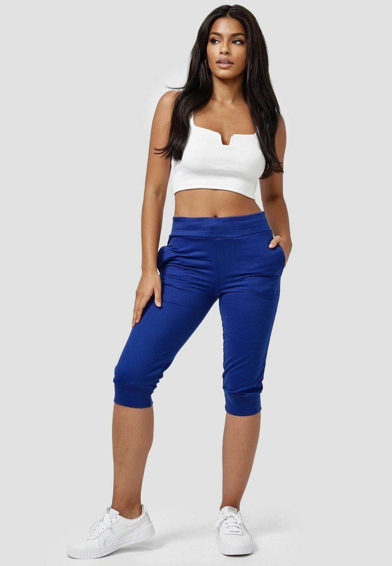 Damen Kleider | enflame Jogginghose blau - UW10163 Damen Kleider | enflame Jogginghose blau - UW10163
