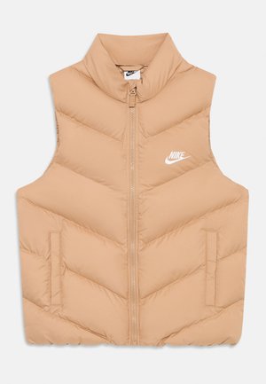Beige Steppweste mit Zickzackmuster, hohem Kragen, Frontreißverschluss und Seitentaschen. Mit weißem Nike-Logo auf der linken Seite.