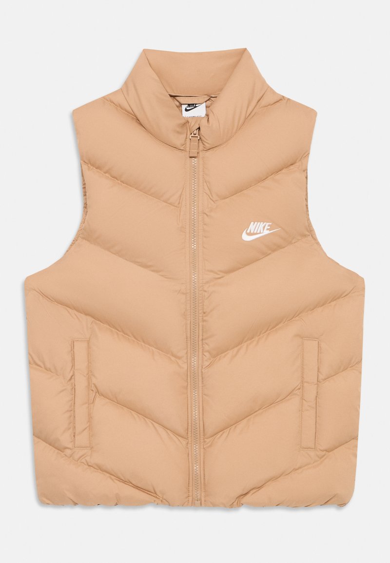Bežna pufasta brezrokavnika s chevron vzorcem, visokim ovratnikom, sprednjim zadrgo in stranskimi žepi. Ima bel Nike logotip na levi strani.