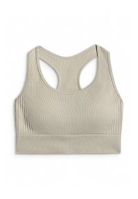 Brassière de sport beige sans couture avec un design dos nageur et un ourlet côtelé, montrant une texture subtile et le logo 4F en bas au centre.