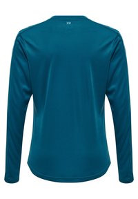 Langarm-Türkishemd aus glattem, leichtem Stoff. Mit einem runden Ausschnitt und einem kleinen Logo im oberen Rücken. Keine Muster oder Akzente.