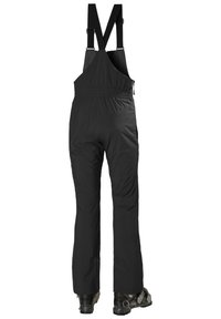 Pantalones de nieve aislantes negros con tirantes ajustables, cintura elástica, piernas ligeramente ajustadas y dobladillos inferiores reforzados.