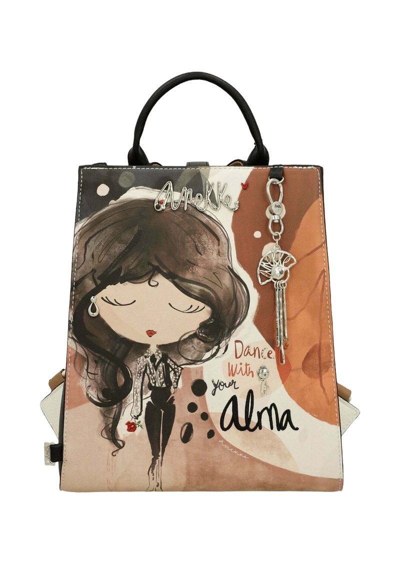 Sac à main multicolore avec un design de personnage illustré, doté d'une anse noire, d'accents argentés et du texte "Danse avec ton Alma".