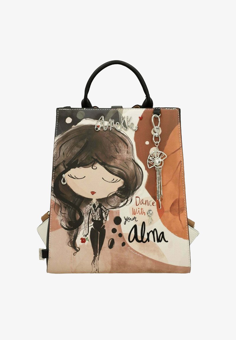 Sac à main multicolore avec un design de personnage illustré, doté d'une anse noire, d'accents argentés et du texte "Danse avec ton Alma".