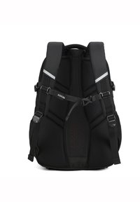 Zaino nero realizzato in tessuto resistente, dotato di schienale in rete imbottito, spallacci regolabili, cinghie laterali decorative e dettagli riflettenti.