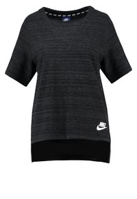 Black short-sleeve athletic top with a textured fabric, a rounded neckline, and a white Nike logo on the lower left side.