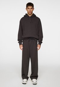 CALLAN Tracksuit bottoms washed black/black
