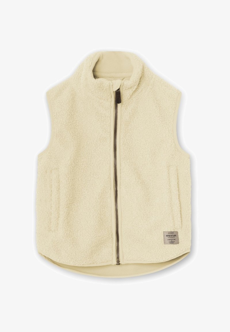 Cream-colored fleece vest with a high collar, zip closure, and two side pockets. Features a textured surface and a label on the bottom right.