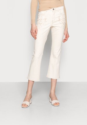 Vaqueros tapered - beige