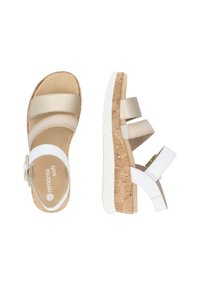 Cork-soled sandals with two beige, glossy straps and a white ankle strap. The sole features a durable, textured white tread.