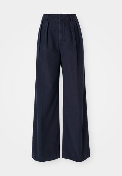 Σκούρο ναυτικό μπλε παντελόνι σε ίσια γραμμή, φτιαγμένο από βαμβάκι, με πιέτες στο μπροστινό μέρος, ψηλή μέση και κλείσιμο με φερμουάρ και κουμπί.