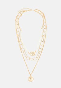 Selecionado, gold-coloured