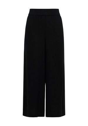 Schwarze weit geschnittene Hose mit einem elastischen Bund, aus einem weichen, atmungsaktiven Stoff; zeichnet sich durch ein lockeres, fließendes Design aus.