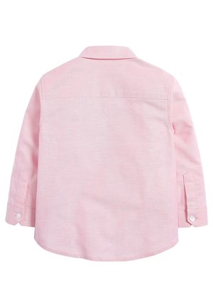 Vue arrière d'une chemise rose à manches longues avec col et poignets boutonnés, présentée sur fond blanc.