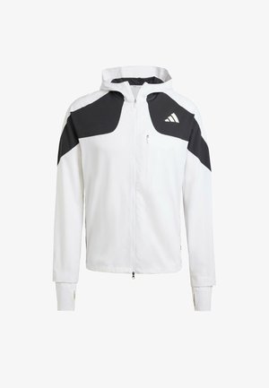 Witte hooded jack met zwarte accenten, voorzien van een volledige rits, een ritszak op de borst en een contrasterend schouderontwerp. Lichtgewicht stof.