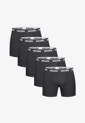 Boxer aderenti da uomo neri realizzati in tessuto morbido, con una vestibilità aderente e un elastico marchiato in bianco con il testo "SMILODOX."