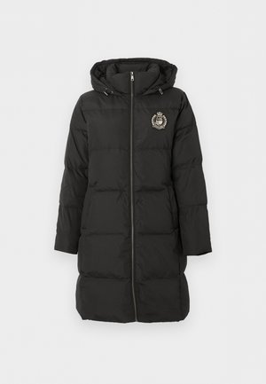 Black long puffer coat with hood, front zipper, side pockets, and embroidered crest on the left chest.