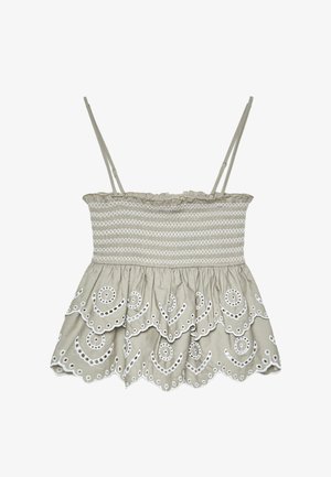 Svetlo bež brezrokavnik s smokanjem na telesu, nabranimi robovi in vezenim belim valovitim robom s krožnimi vzorci.