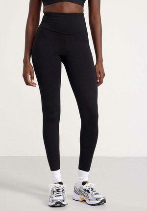 - Legginsy