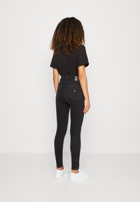 Tommy Jeans Jeans Skinny Fit - black denim