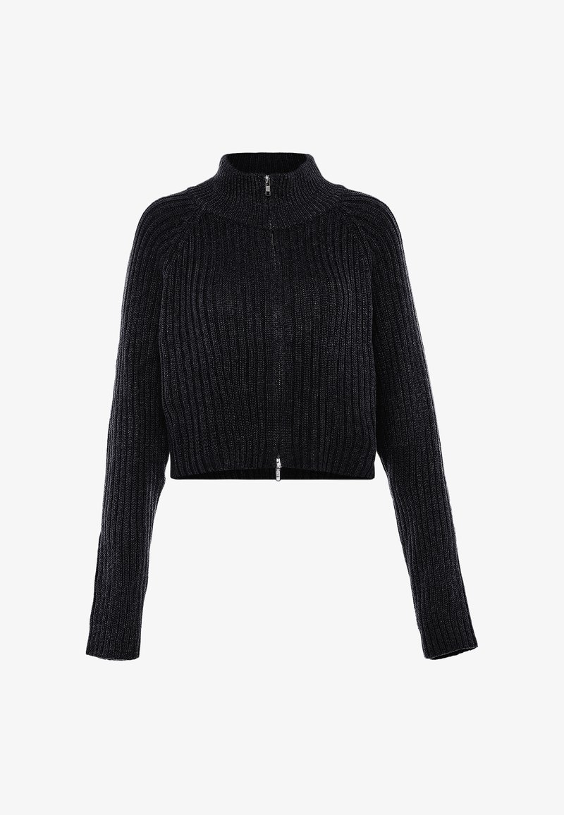 Juoda struktūruota, susitraukusi megztinis su ilgomis rankovėmis ir priekiniais užtrauktukais, besitęsiančiais nuo kaklo iki apvado.