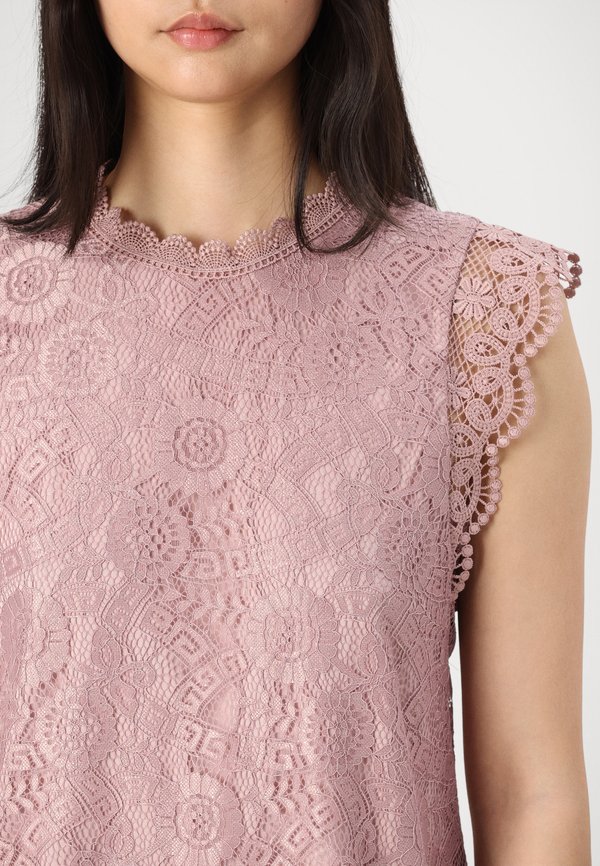 PCOLLINE  - Top - woodrose2